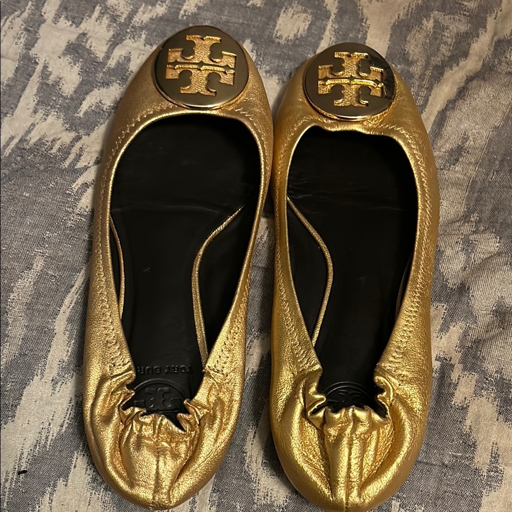 Tory Burch Gold Ballet Flats — mixed size — left is 7.5 and right is 8